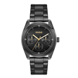 A Hugo watch with a black stainless steel case and link bracelet, featuring a black dial with gold-tone hands and indices.