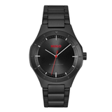 A Hugo watch with a matte black stainless steel case and integrated link band, featuring a black dial with a red HUGO logo and a red second hand.
