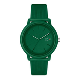 A green Lacoste watch with a textured silicone strap, matching green dial and case, and silver-tone hands, shown on a plain white background.