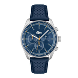 Lacoste chronograph watch with a blue dial, silver-tone case, and perforated blue strap on a white background.