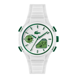 A white and green Lacoste watch with a textured silicone strap, featuring a white dial with green accents, a crocodile logo, and digital display details.