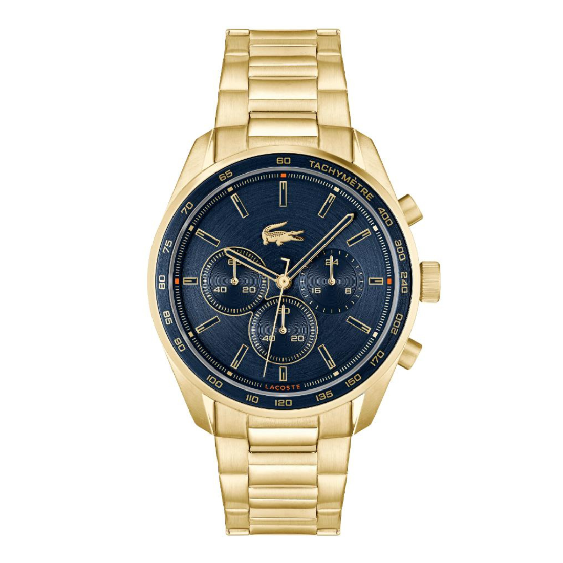 A gold-tone stainless steel chronograph watch by Lacoste with a dark blue dial, featuring three subdials, a crocodile logo on the face, and a matching gold-tone link bracelet, shown against a plain white background.