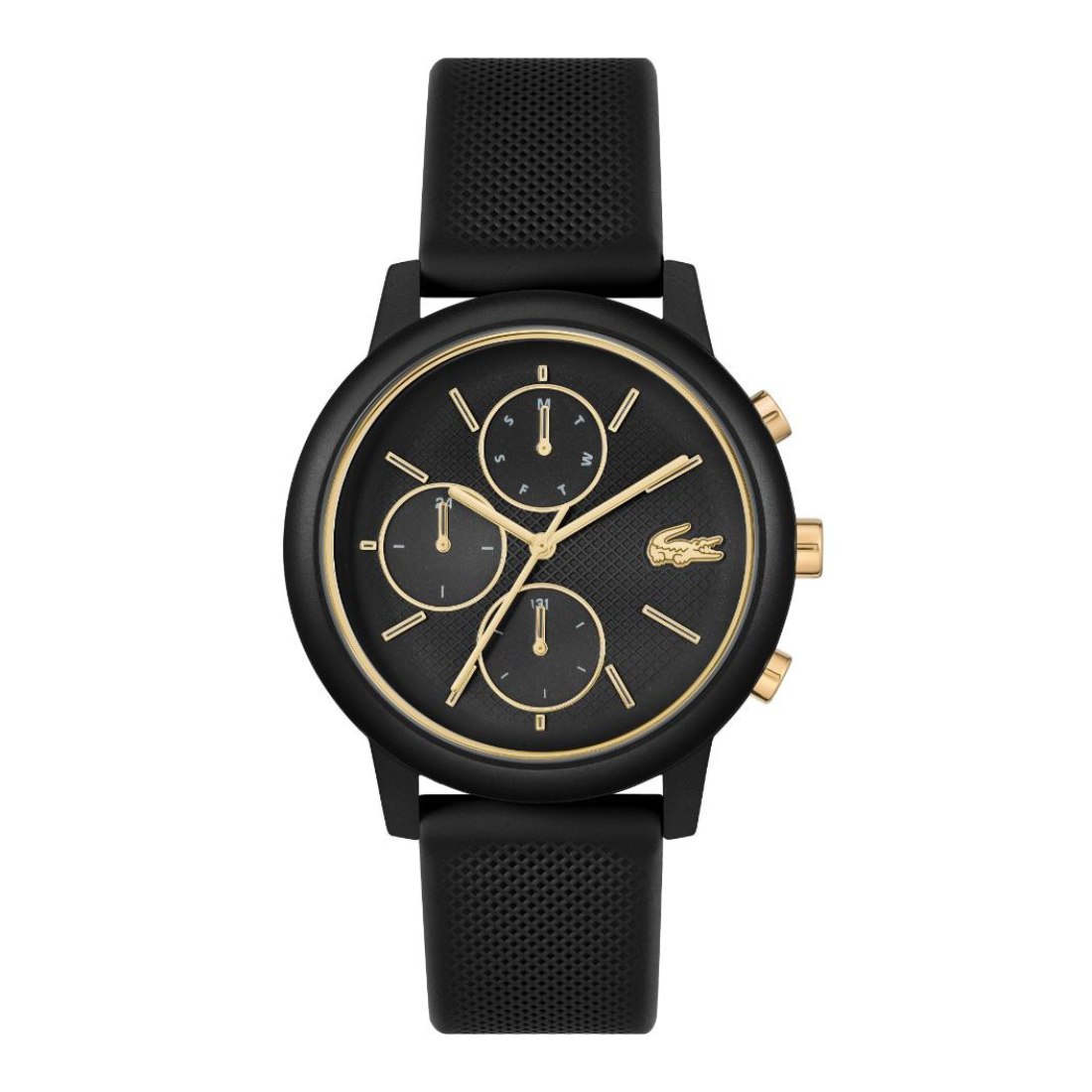 A black chronograph watch with a textured black strap, a black dial with gold-tone hands and indices, and the Lacoste crocodile logo at the 3 o'clock position.