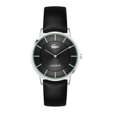 Lacoste watch with a black leather strap, black dial, silver-tone case, and a thin green accent ring on a white background.