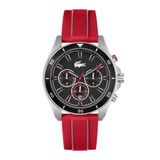 A luxury chronograph watch featuring a textured red silicone strap, a silver stainless steel case, and a black dial with three sub-dials and a red crocodile logo.