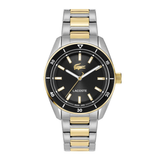 Lacoste two-tone stainless steel and gold watch with a black dial, black bezel, and matching two-tone link bracelet on a white background.