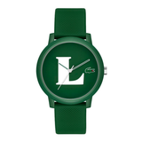 A green Lacoste watch with a matching green silicone strap, featuring a white 'L' logo and the crocodile emblem on the dial, set against a plain white background.