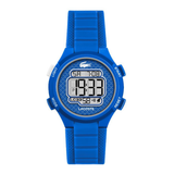 A Lacoste digital watch with a bright blue silicone strap and matching blue case, featuring a white digital display and white text labels on the side buttons.