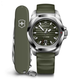 Green watch with silver case and green pocket knife on a white background
