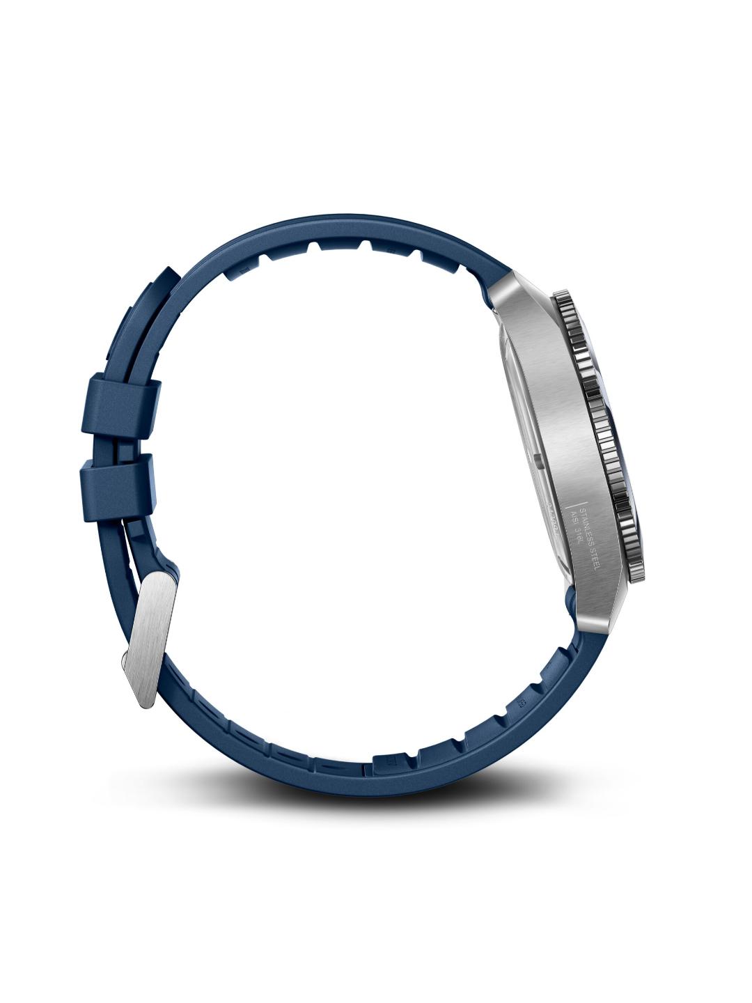 A close-up side view of a smartwatch with a dark blue silicone strap and a silver stainless steel case, shown against a plain white background.