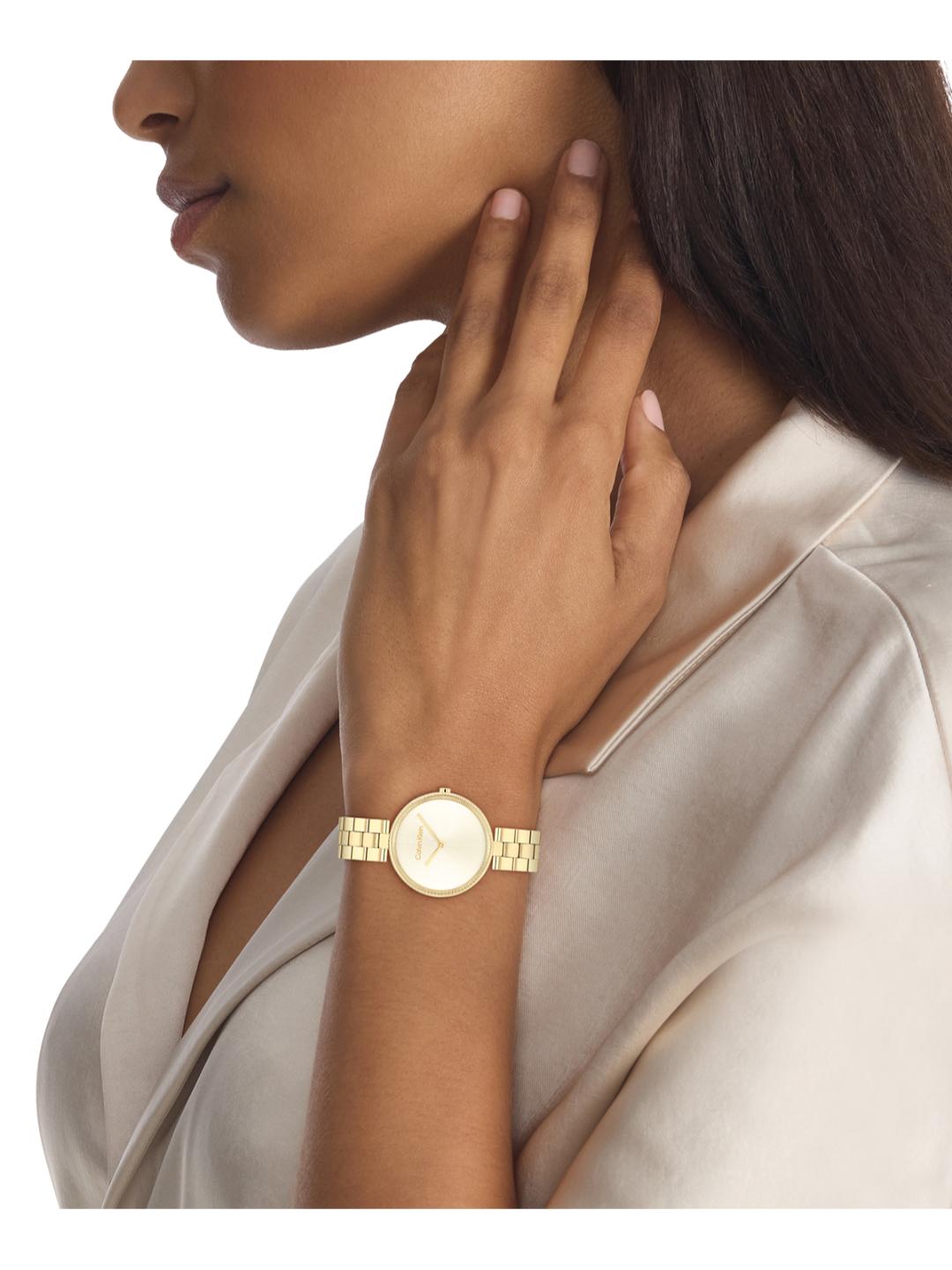 Calvin Klein Gleam Qtz Basic Slim Light Champagne Round Dial Women's Watch 25100014