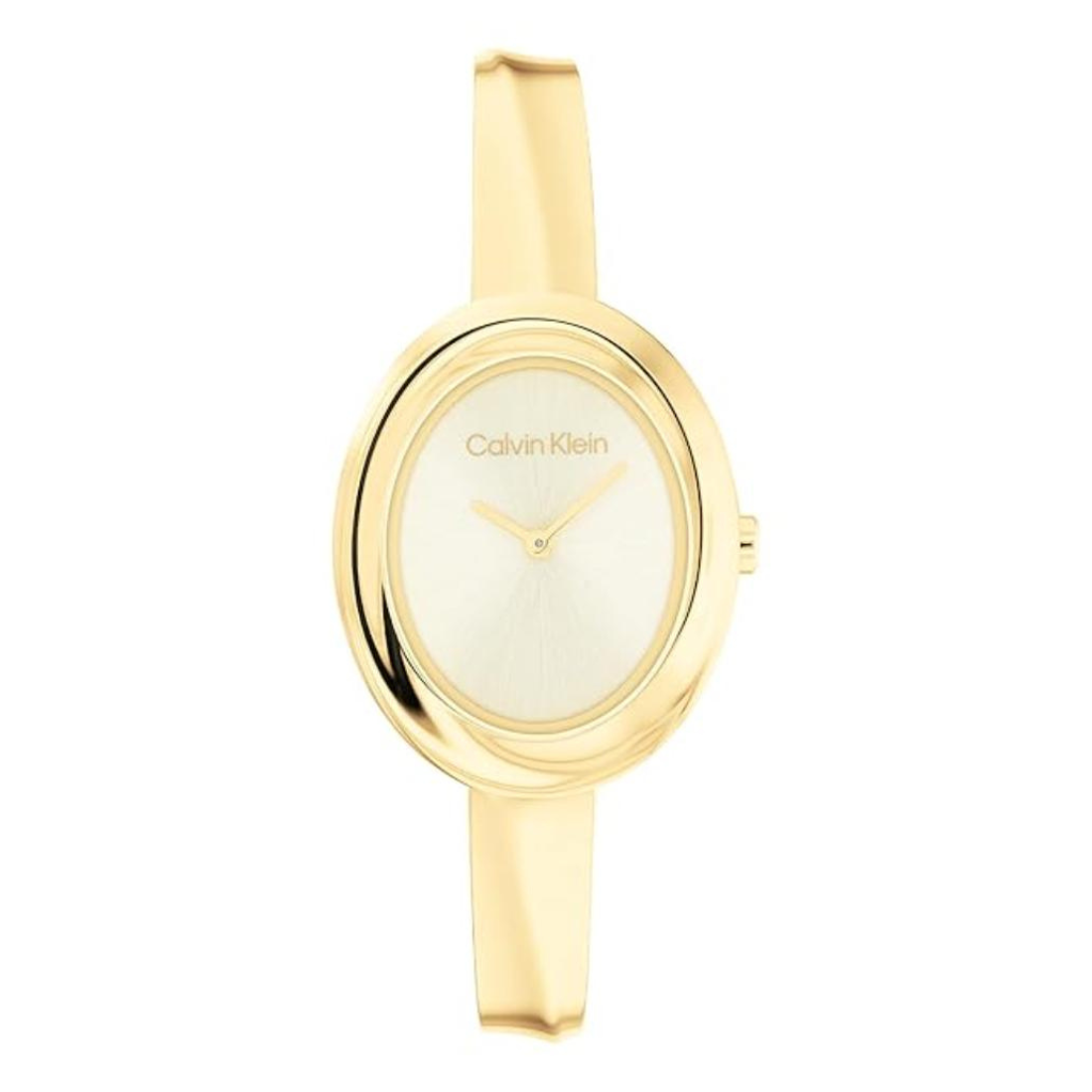 A Calvin Klein women's watch featuring a sleek, rounded gold-tone oval case, a white dial with gold-tone hands, and a matching gold-tone silicone strap, shown against a plain white background.
