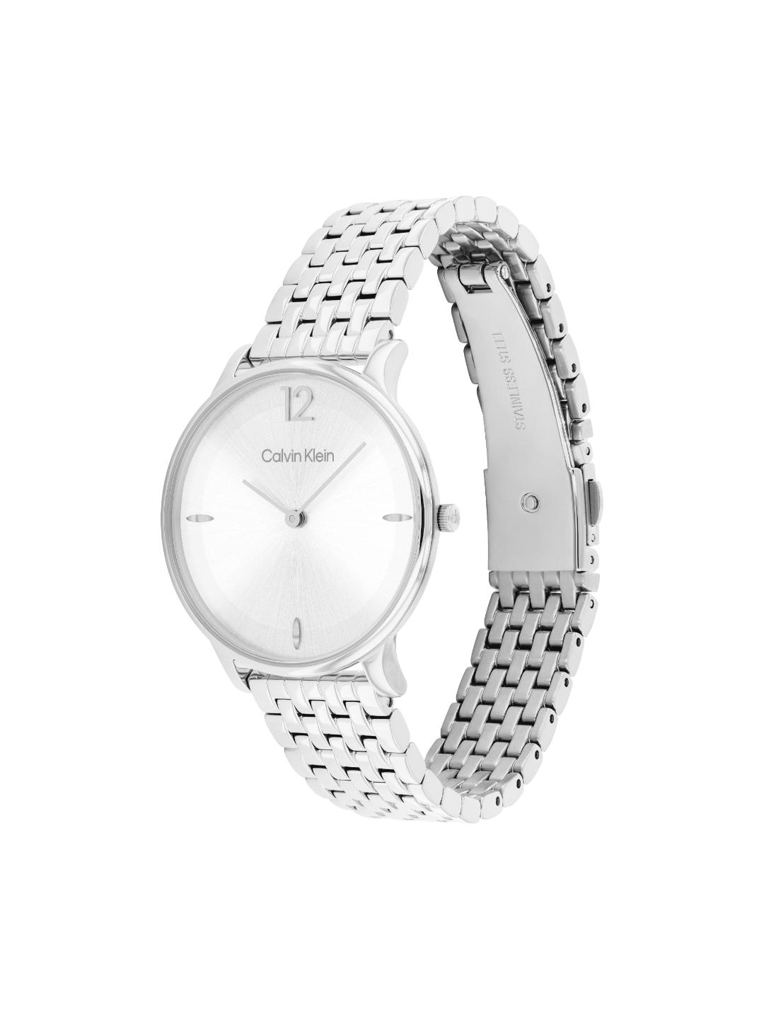 A Calvin Klein silver-tone stainless steel watch with a matching link bracelet, shown at a three-quarter angle on a plain white background.