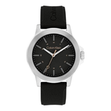 Calvin Klein watch with a black dial, silver-tone case, and black textured strap on a white background.