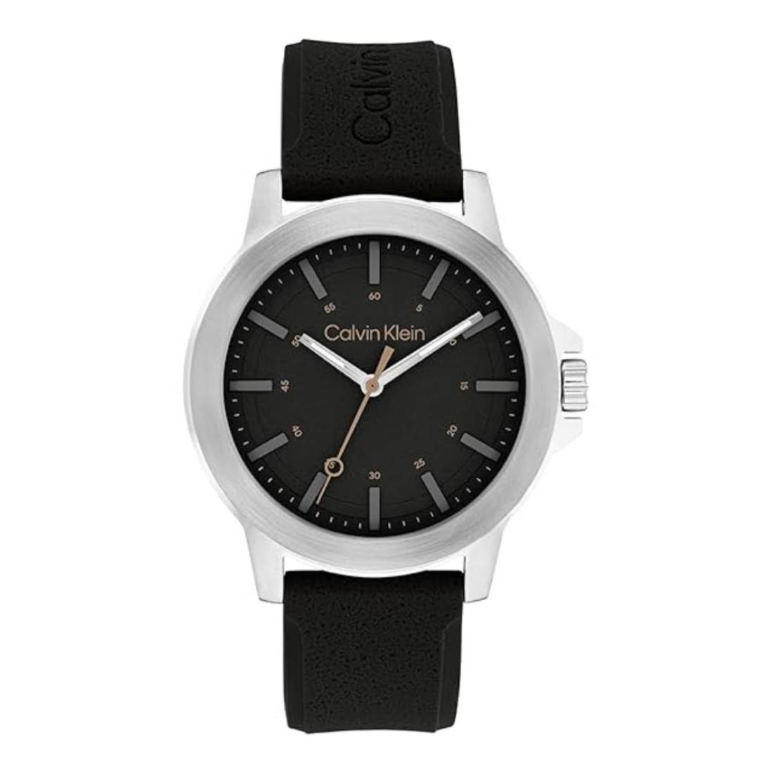 Calvin Klein watch with a black dial, silver-tone case, and black textured strap on a white background.