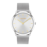 Calvin Klein analog watch with a silver stainless steel case, silver mesh strap, and a white dial with gold-tone hands and hour markers.