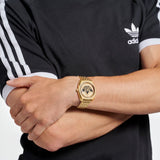 Adidas Originals Gold Tone Dial Unisex Analog Watch AOFH23509