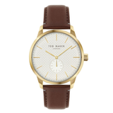 Ted Baker watch with brown leather strap and gold case on white background