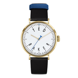 Watch with black strap and gold case on a white background