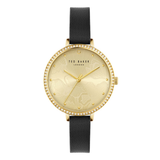 Gold watch with black strap on a white background