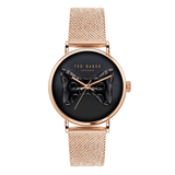 Ted Baker watch with black dial and rose gold accents on a white background
