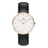 Black watch with a white face and rose gold accents on a white background