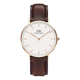 Daniel Wellington watch with brown leather strap and white dial on a white background