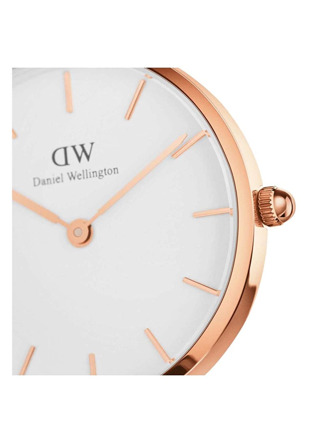 Daniel Wellington watch with rose gold case and white face on a white background