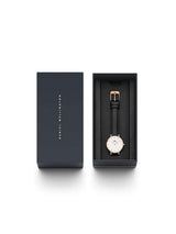 Daniel Wellington watch in a black box on a white background