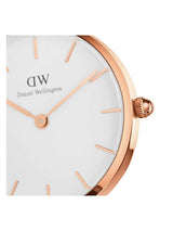 Daniel Wellington watch with rose gold case and white face on a white background