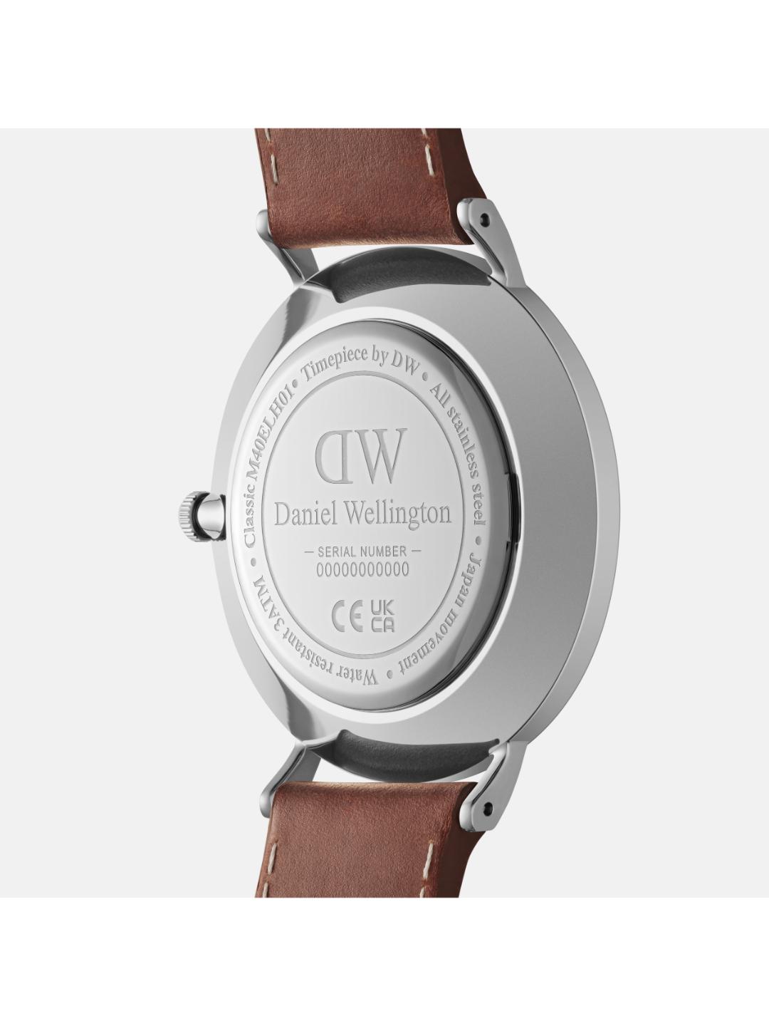 Back view of a Daniel Wellington watch with brown leather strap and silver case.