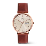 Daniel Wellington watch with brown leather strap and rose gold case on white background