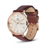 Watch with brown leather strap and rose gold case on white background