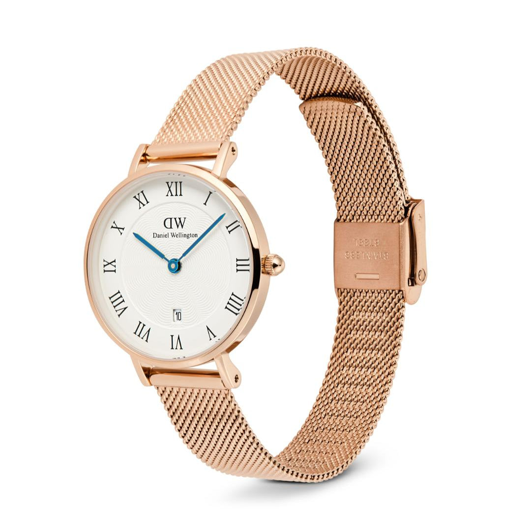 Rose gold watch with white face and blue hands on a white background