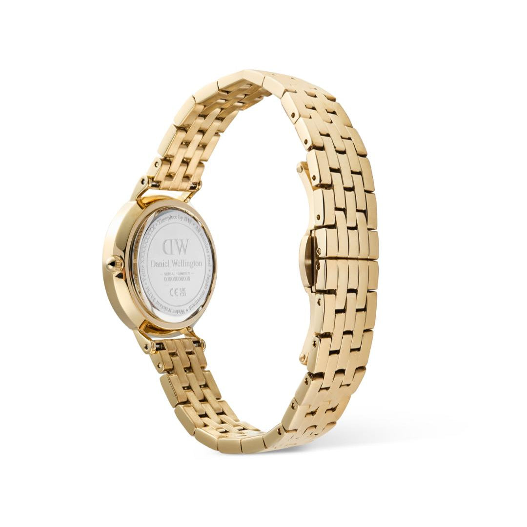 Gold watch with a white face on a white background
