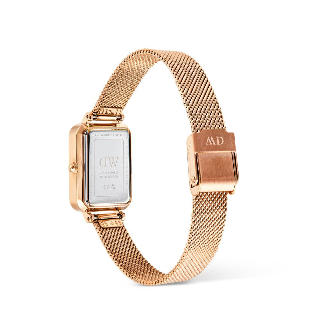 Rose gold watch with mesh band on a white background