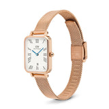 Rose gold watch with a white face on a white background