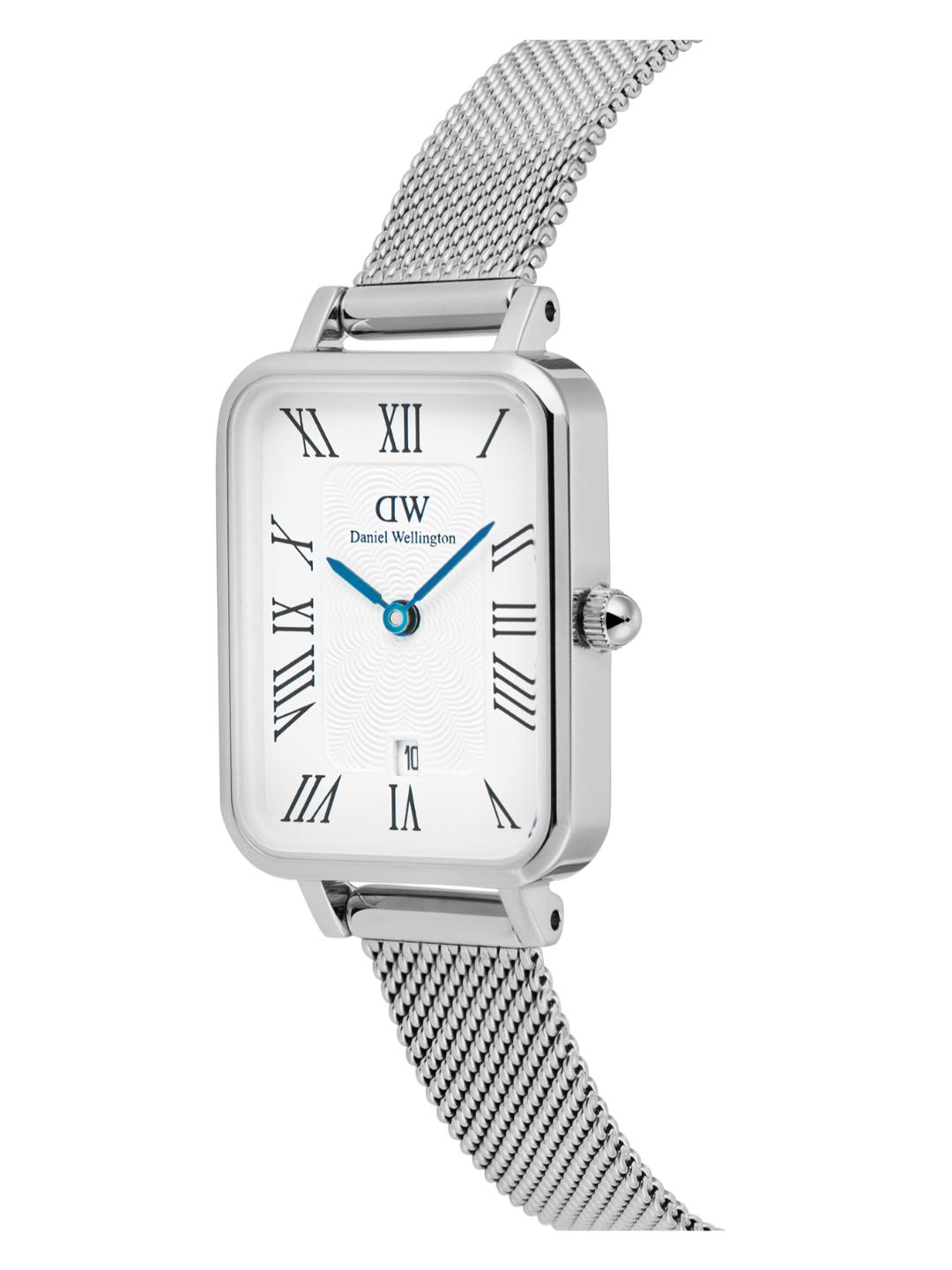 Silver watch with mesh band on a white background