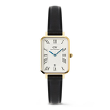 Watch with black strap and gold case on a white background