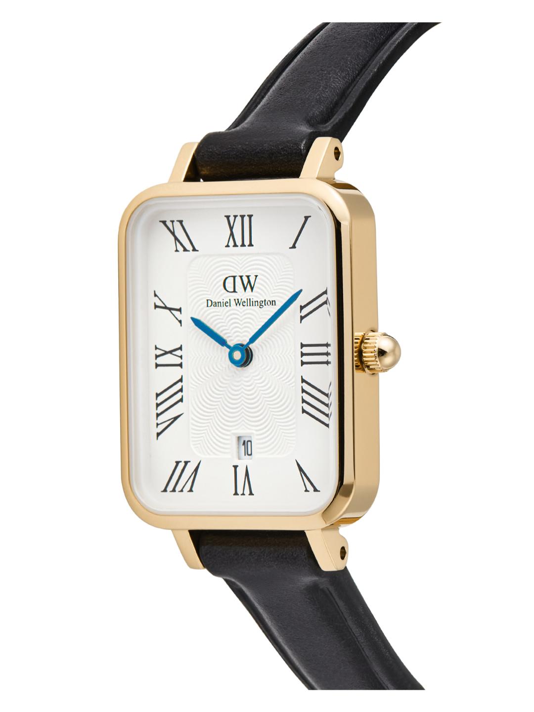 Daniel Wellington watch with black strap and gold case on a white background