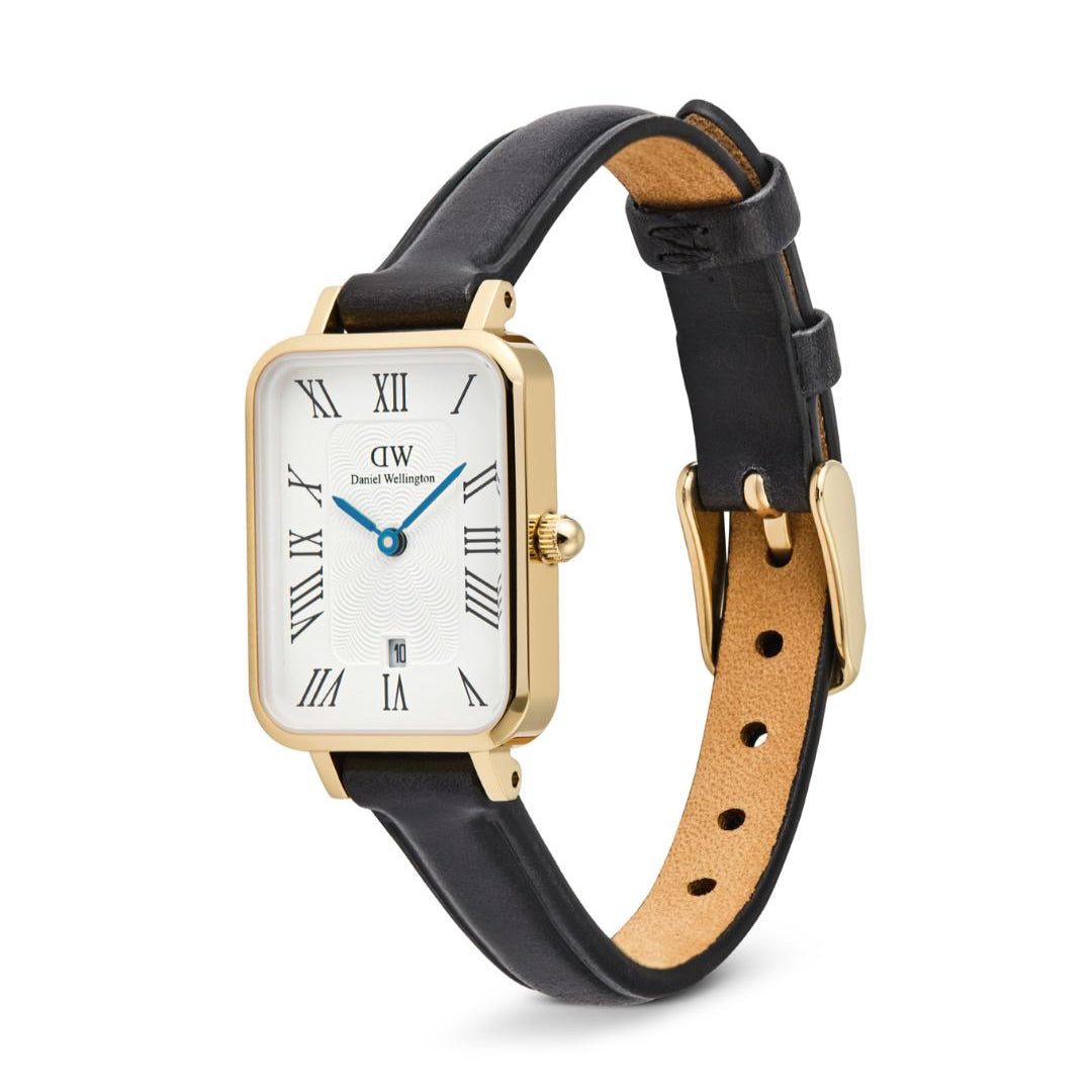 Watch with black leather strap and rose gold case on white background