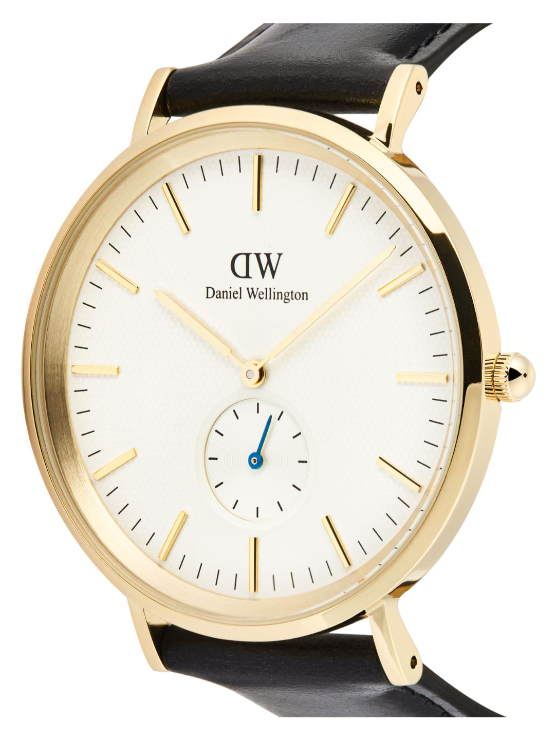 Gold watch with white face and black strap on a white background