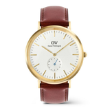 Daniel Wellington watch with gold case and brown leather strap on a white background