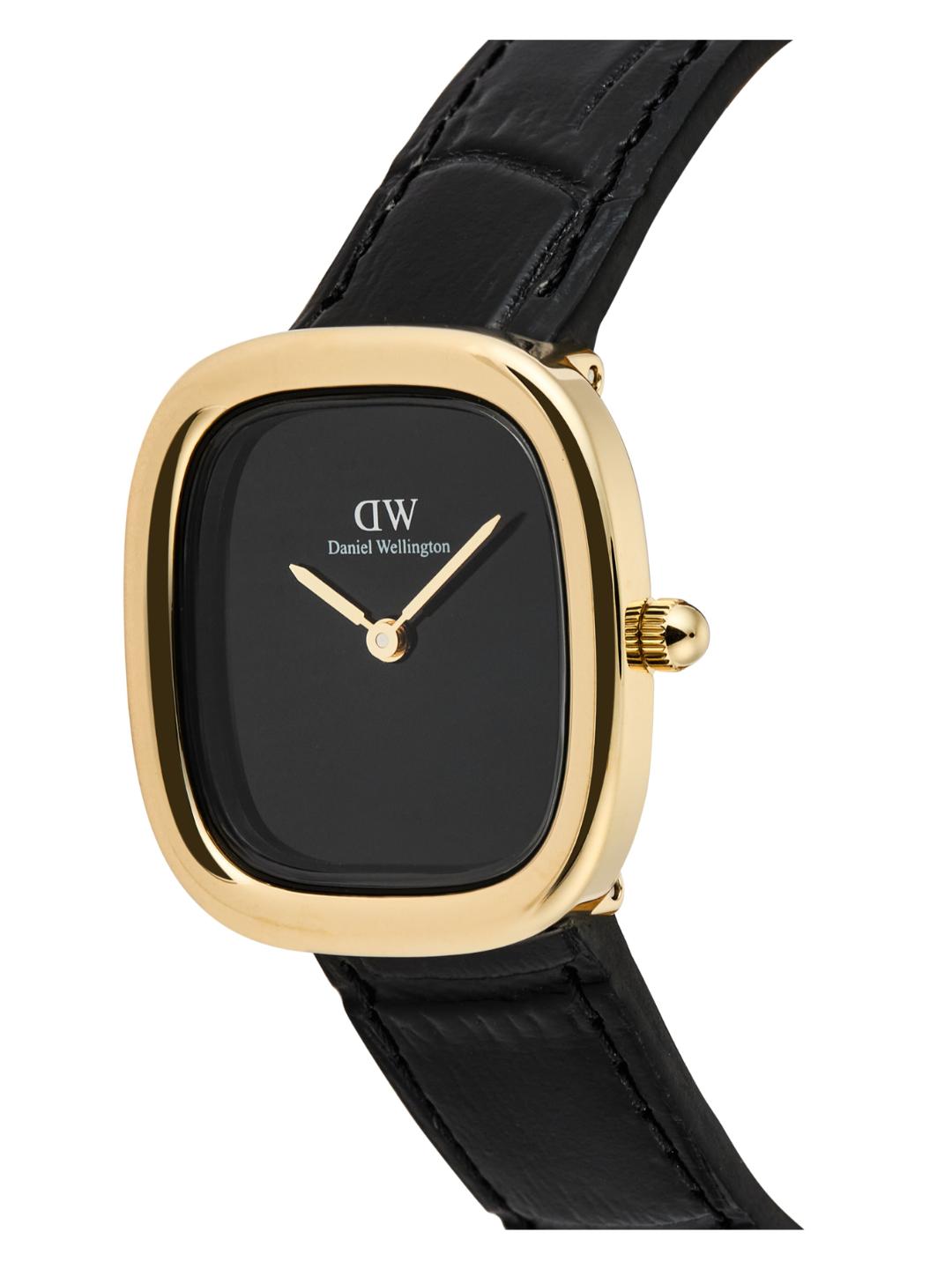 Gold watch with black face and strap on a white background