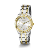 Two-tone Guess watch with a white face and gold accents on a white background