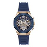 A Guess men's chronograph watch featuring a blue silicone strap, a blue dial with gold-tone subdials and markers, and a gold-tone octagonal case.
