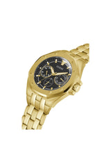 Gold wristwatch with a black face on a white background