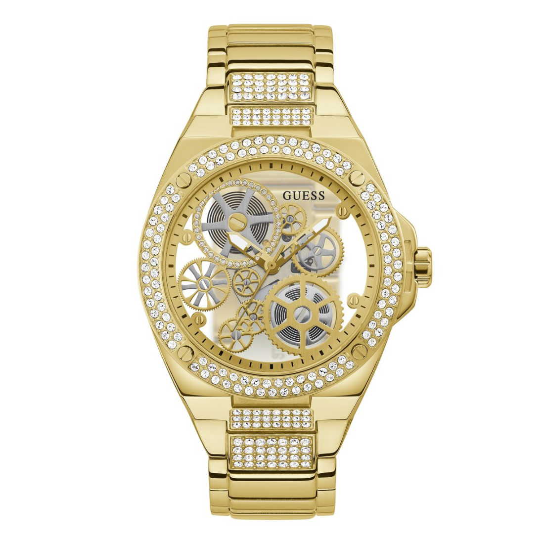 Gold-tone Guess women's watch with a skeleton dial, crystal-studded bezel and bracelet links, and visible internal gears on a white background.