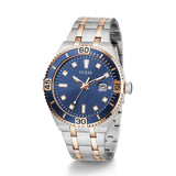 Two-tone watch with blue dial and rose gold accents on a white background