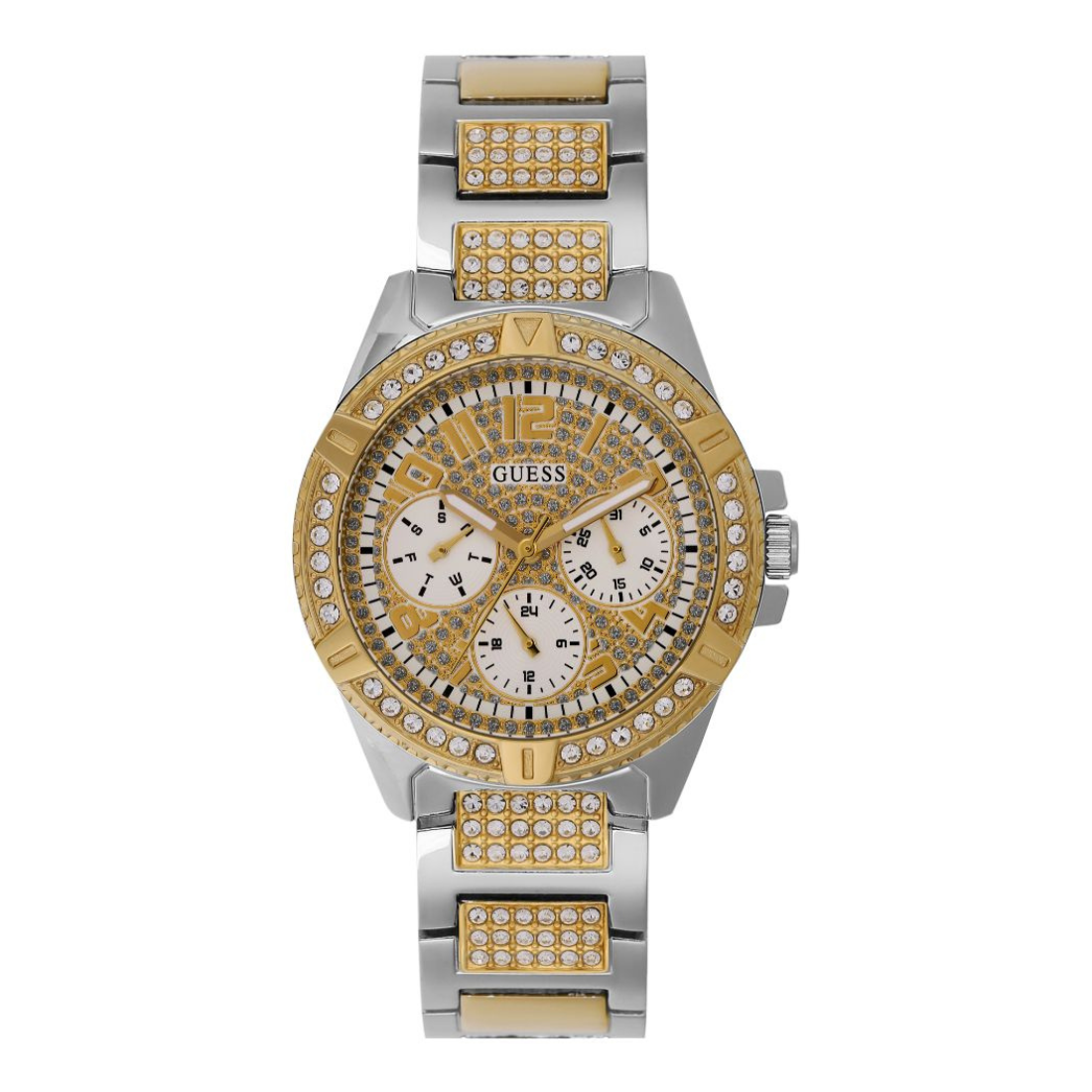 A Guess women's analog watch with a white dial and gold-tone casing, featuring a two-tone bracelet with silver and gold links, and adorned with multiple crystals around the dial and casing.